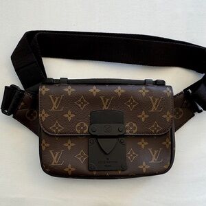 Louis Vuitton S Lock Sling Bag in Monogram Macassar canvas.